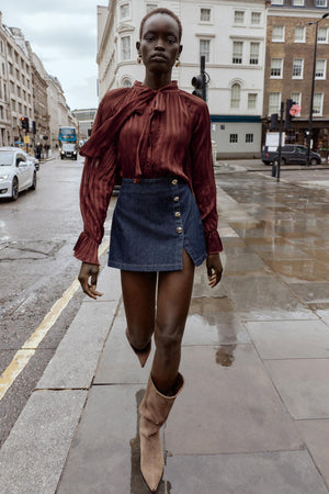 SAIA-CALÇÃO CRUZADA COM BOTÕES